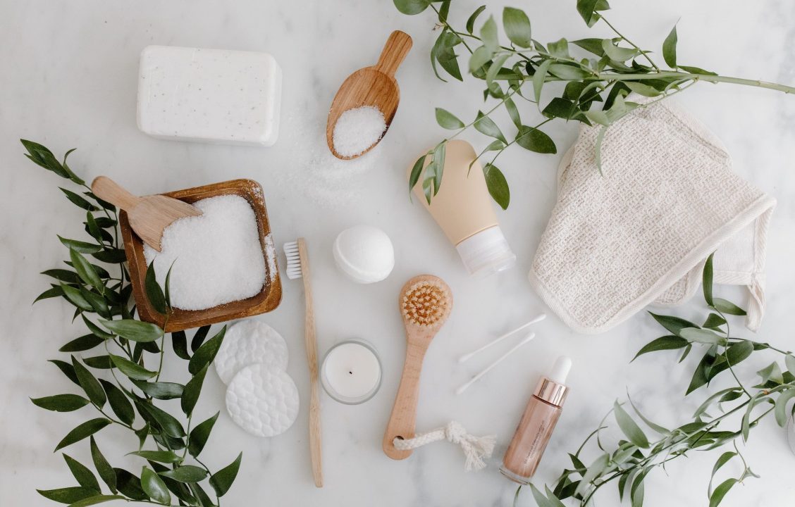 body care products on a small bathroom table