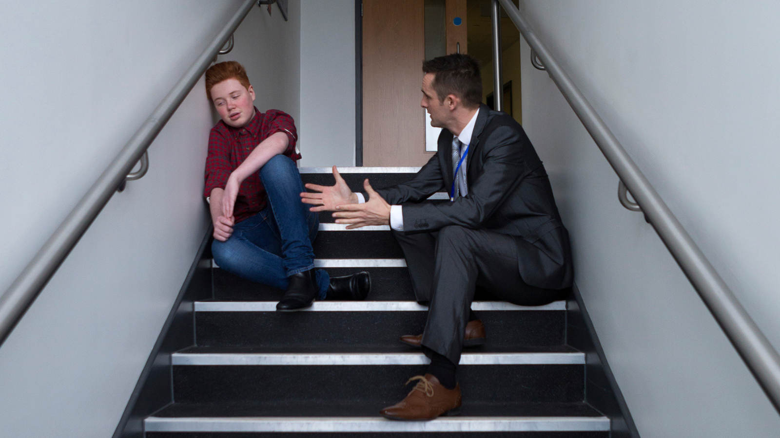 Photo of teacher pleading with student raised on gentle parenting